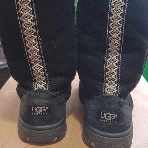 Ugg tall black boots with embroidered stitching on back. Great condition!
